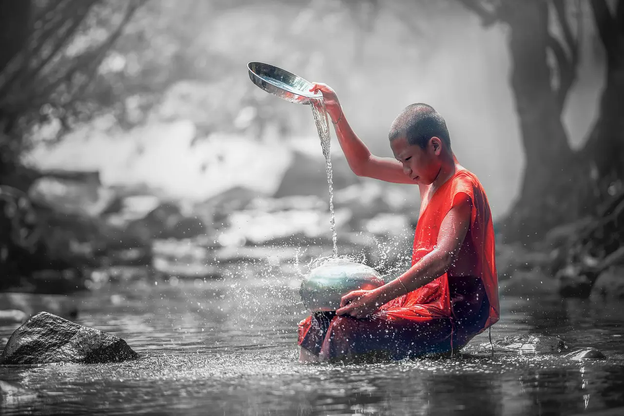 Boy Pouring Water