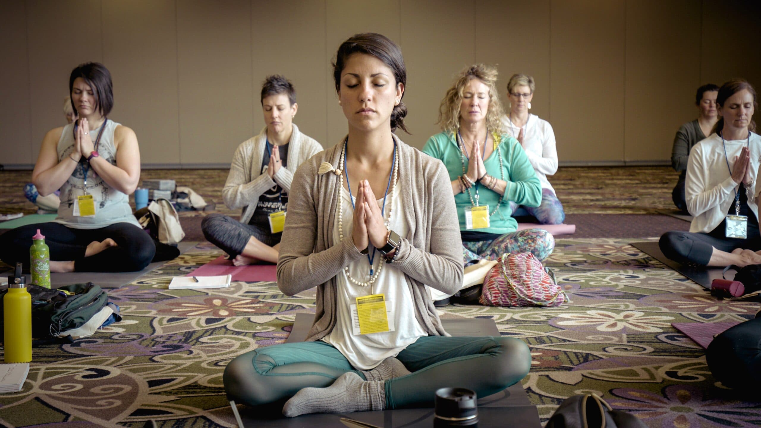 Meditation Group erik-brolin unsplash Portrays meditation in action